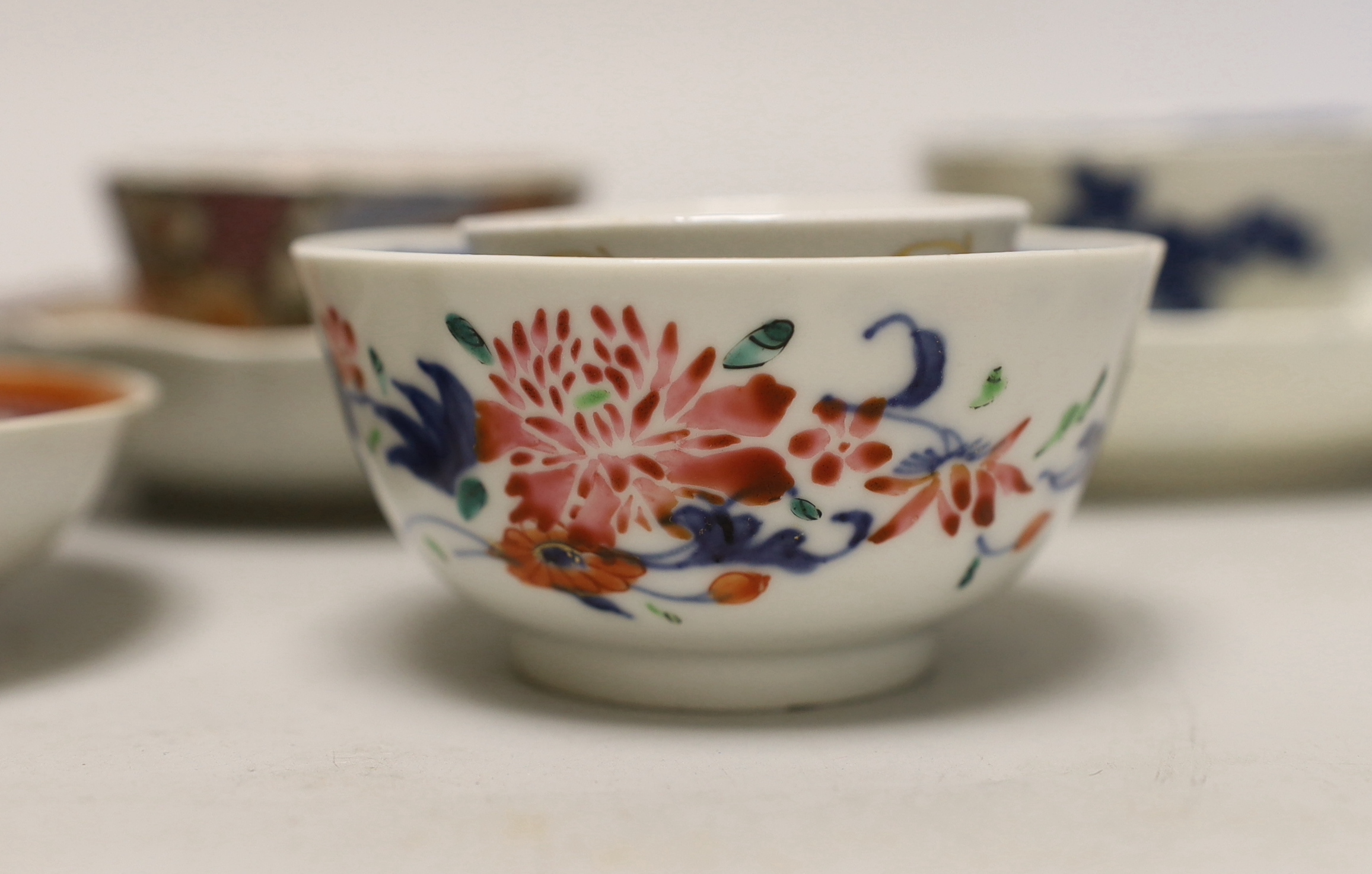 Three 18th century Chinese famille rose tea bowls and matching saucers, a Caughley teabowl and saucer and a single tea bowl and smaller tea bowl